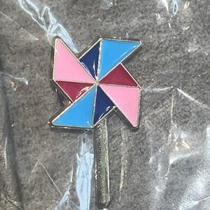 Gold Pinwheel Enamel Lapel Pin